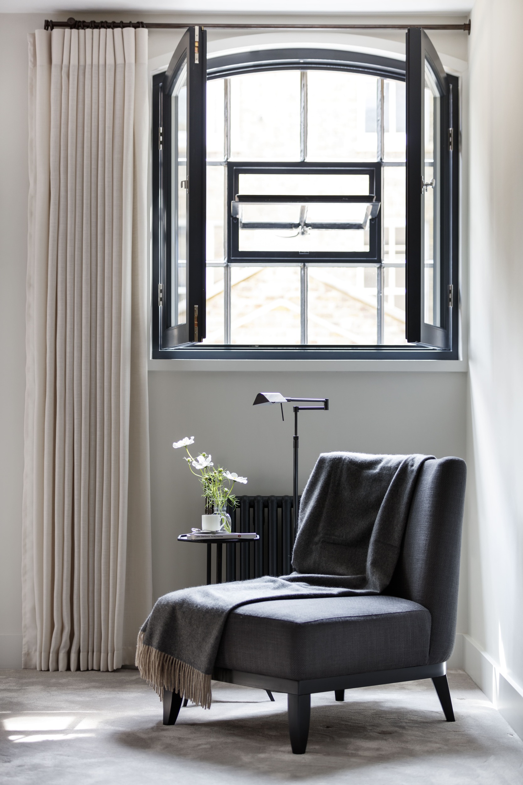 Armchair with black framed window
