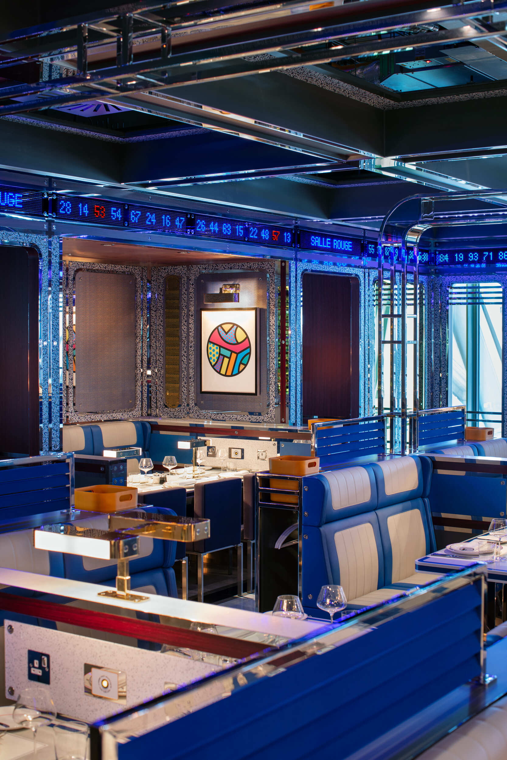 mega yacht inspired blue diner booths with brass lamps