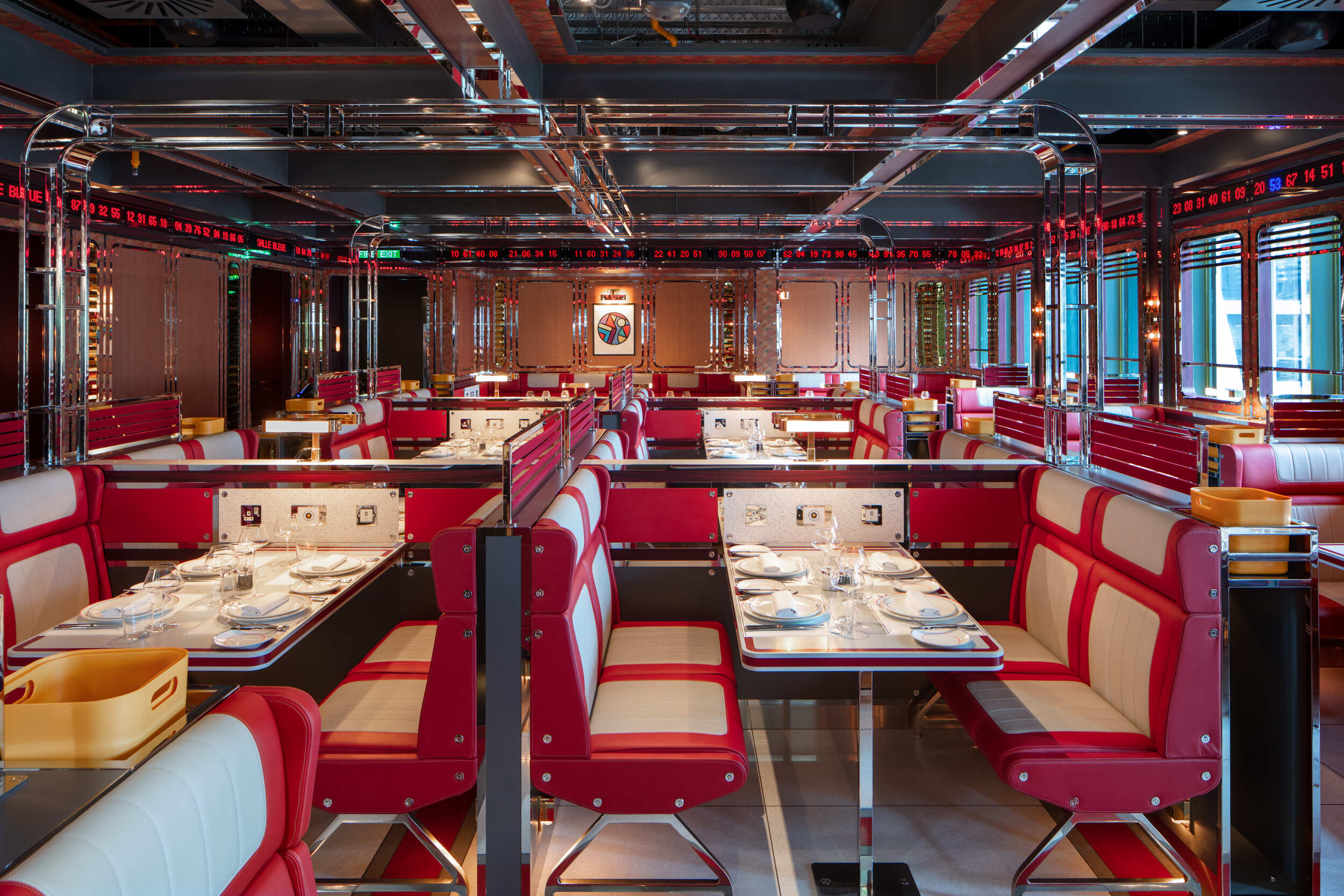 Red diner seating with standout chrome finishes