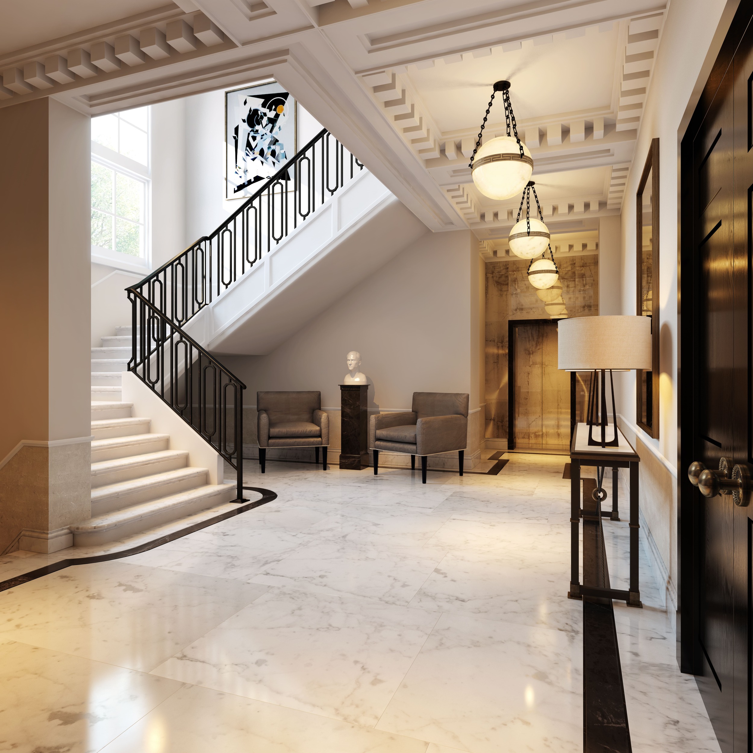 Marble floored hallway and grand staircase
