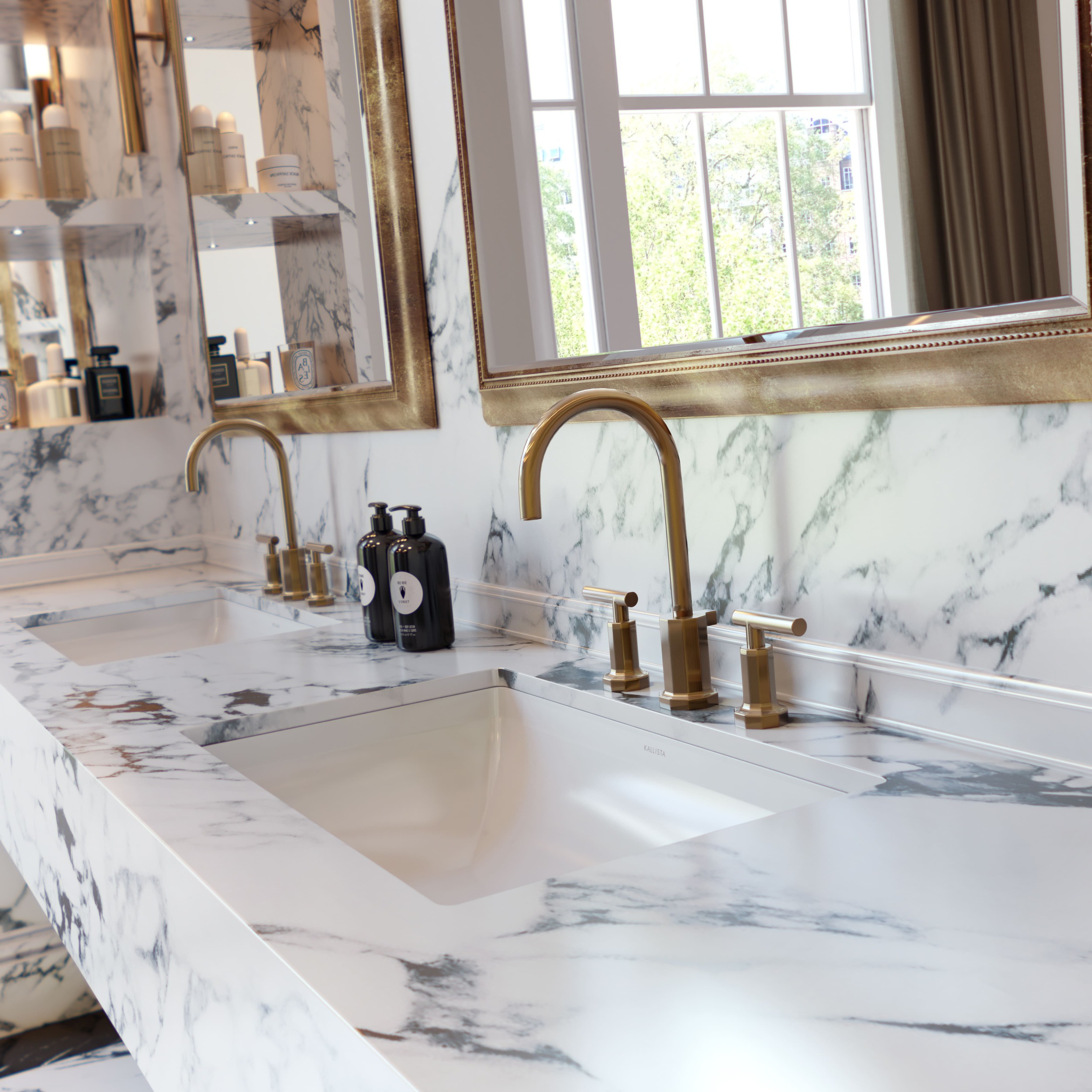 Duo of marble bathroom basin with brass taps and matching mirrors