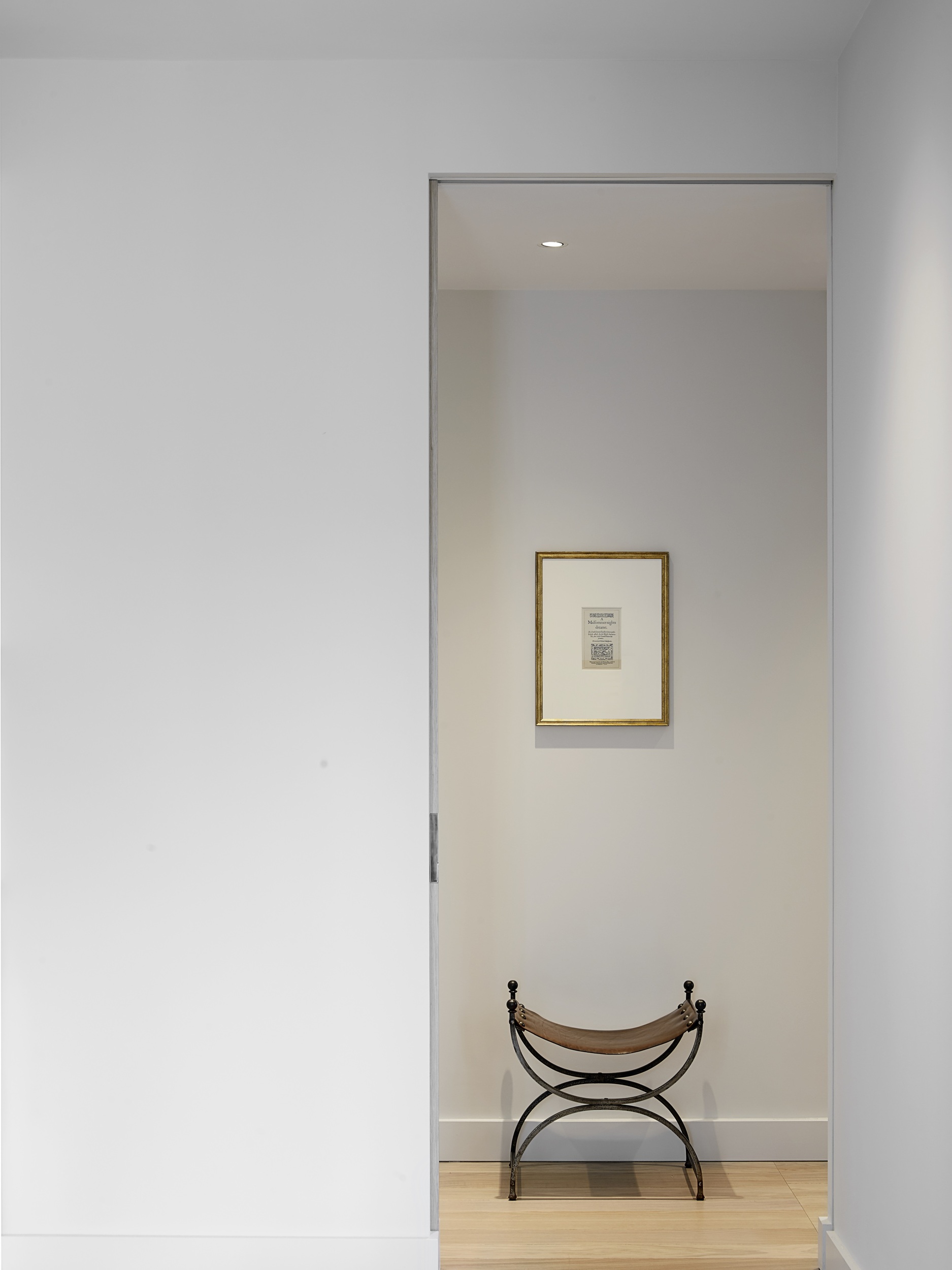 Serene hallway chair and art piece