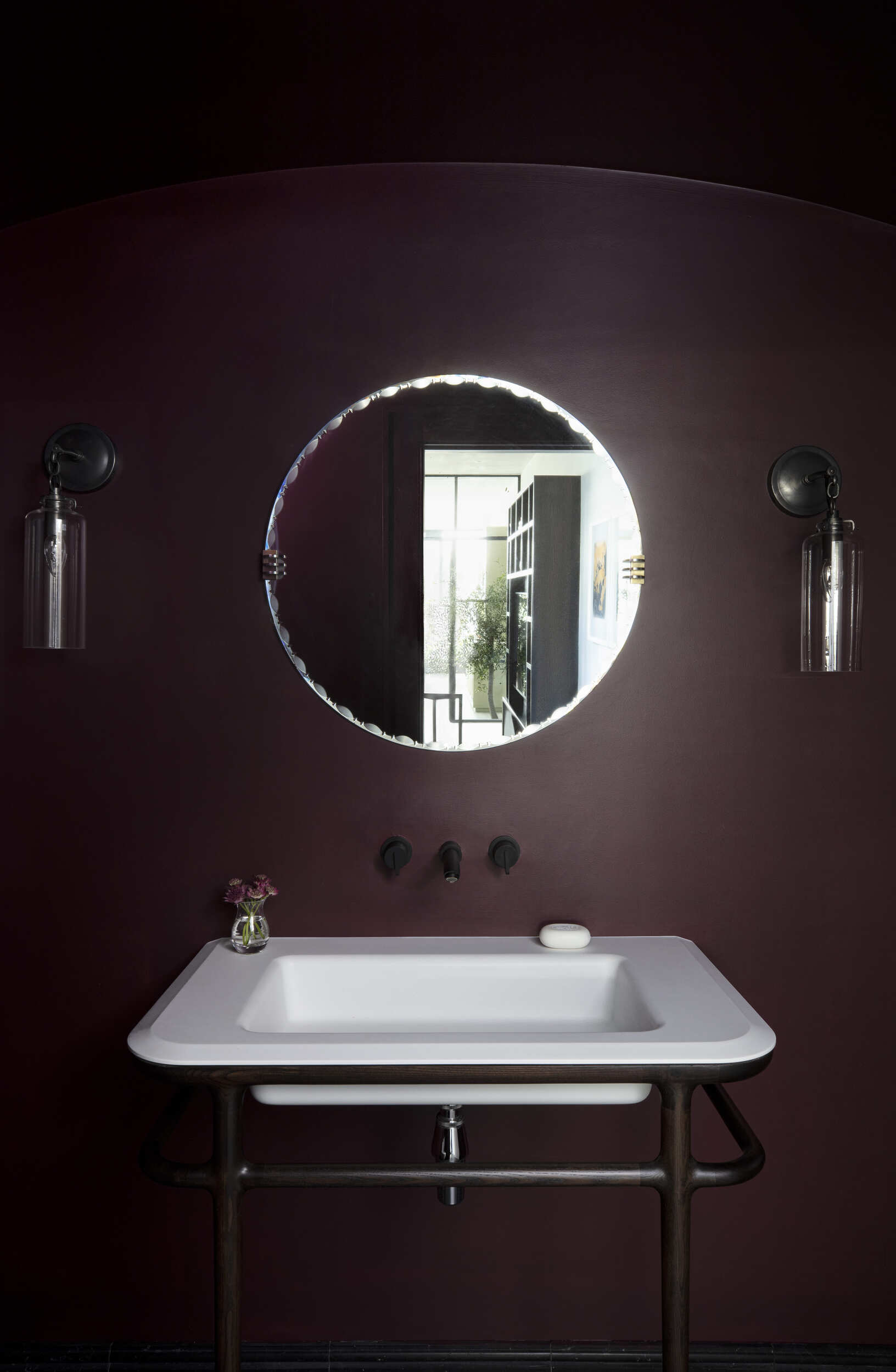 W/C sink with wall mounted mirror and two wall lights