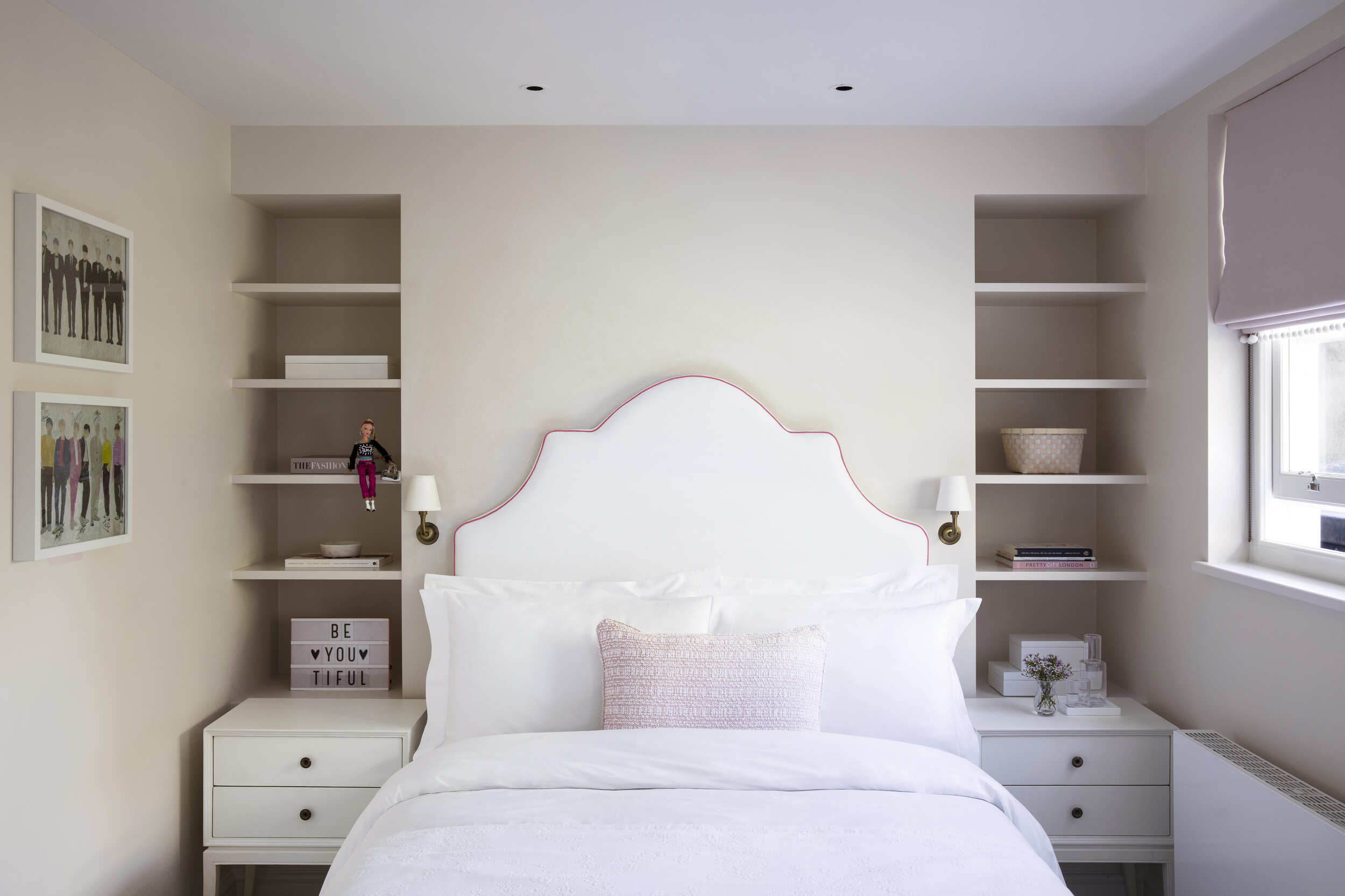 Bedroom with shelving on both sides