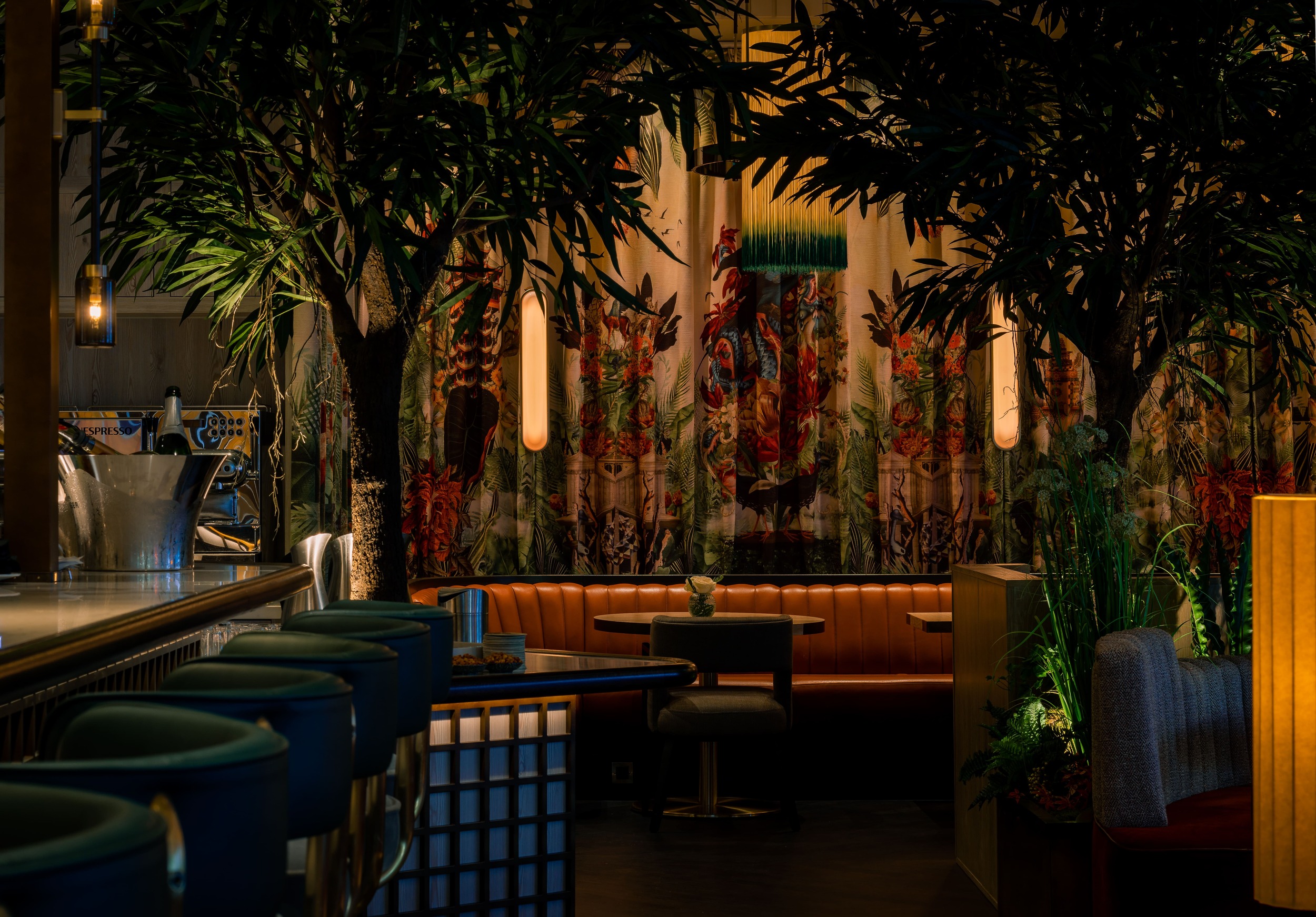 Low-lit bar with large Longifolia Cabana trees