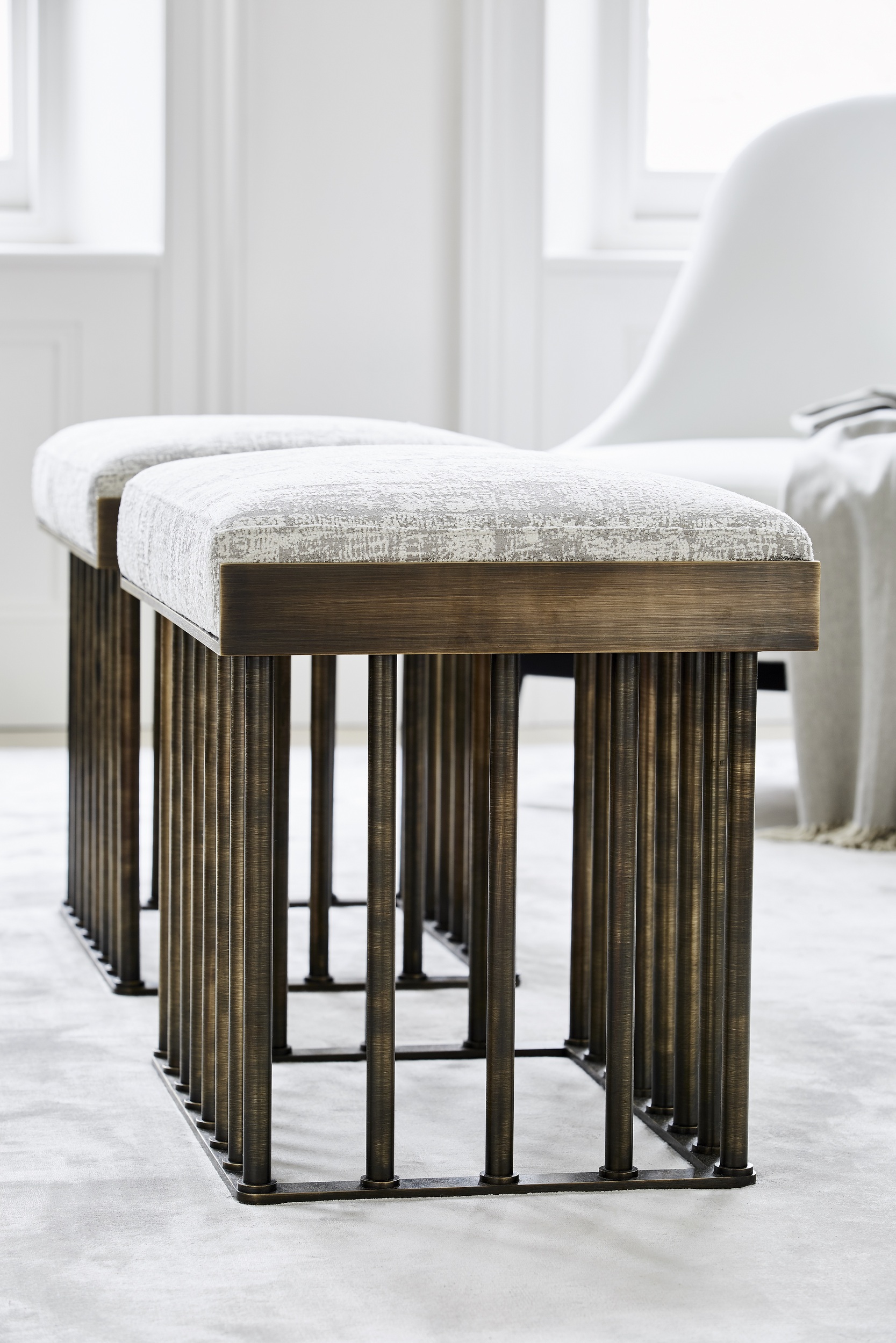 Two stylish wooden cushioned stools