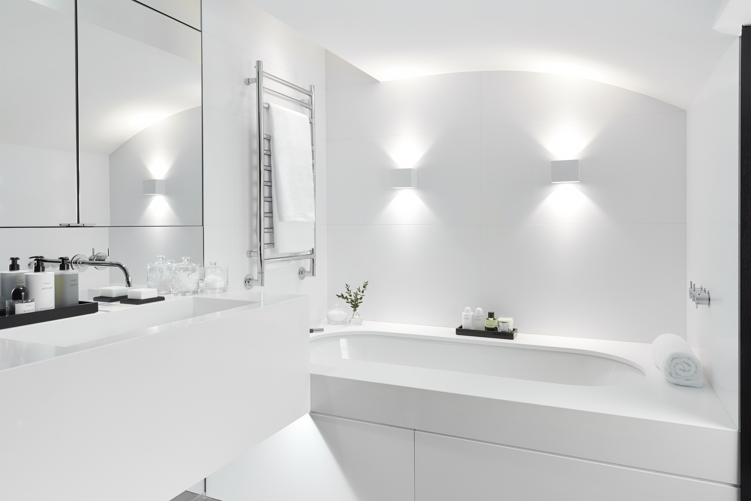 Dazzling white bathroom with bathtub