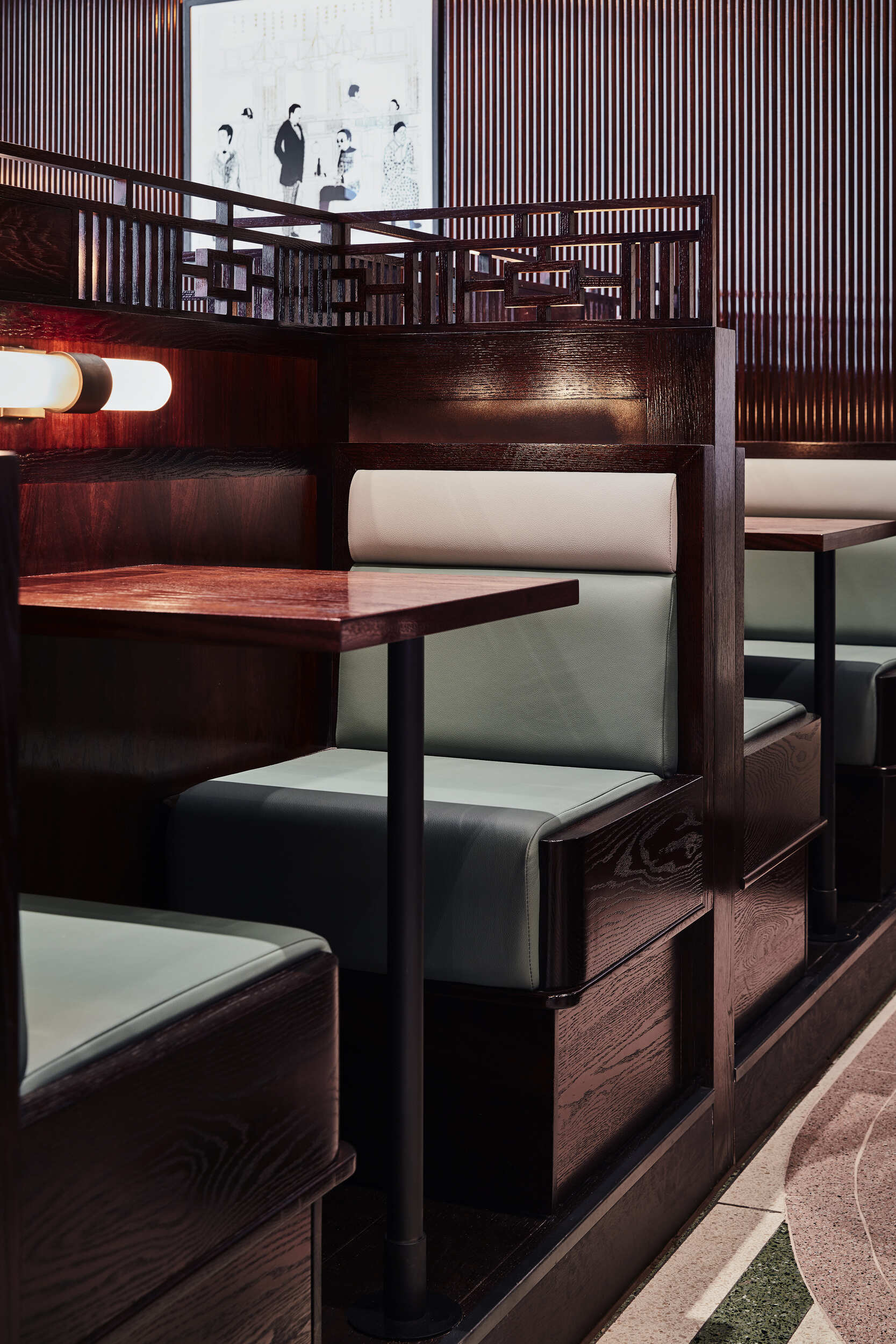 Intimate dining booths with two-tone seats