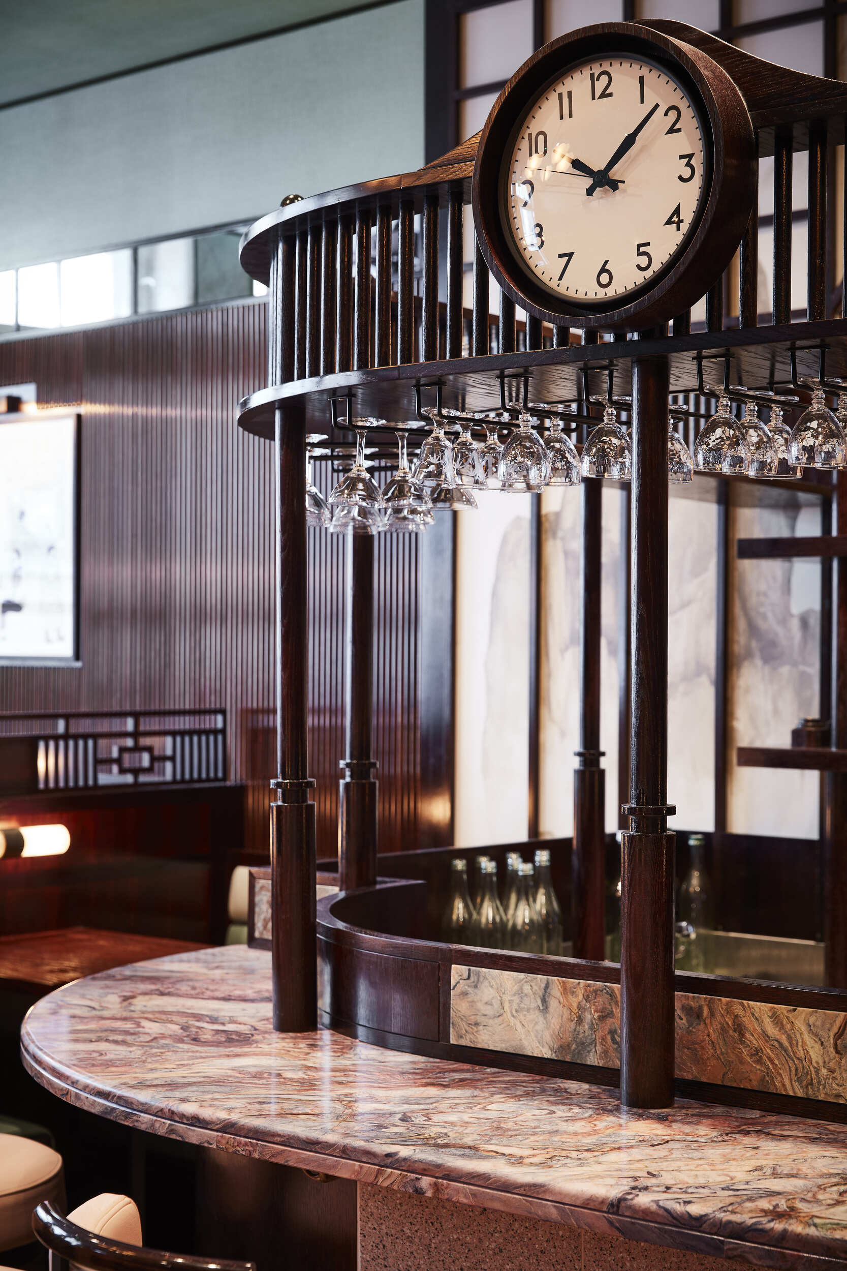 Wooden structured bar with integrated vintage clock