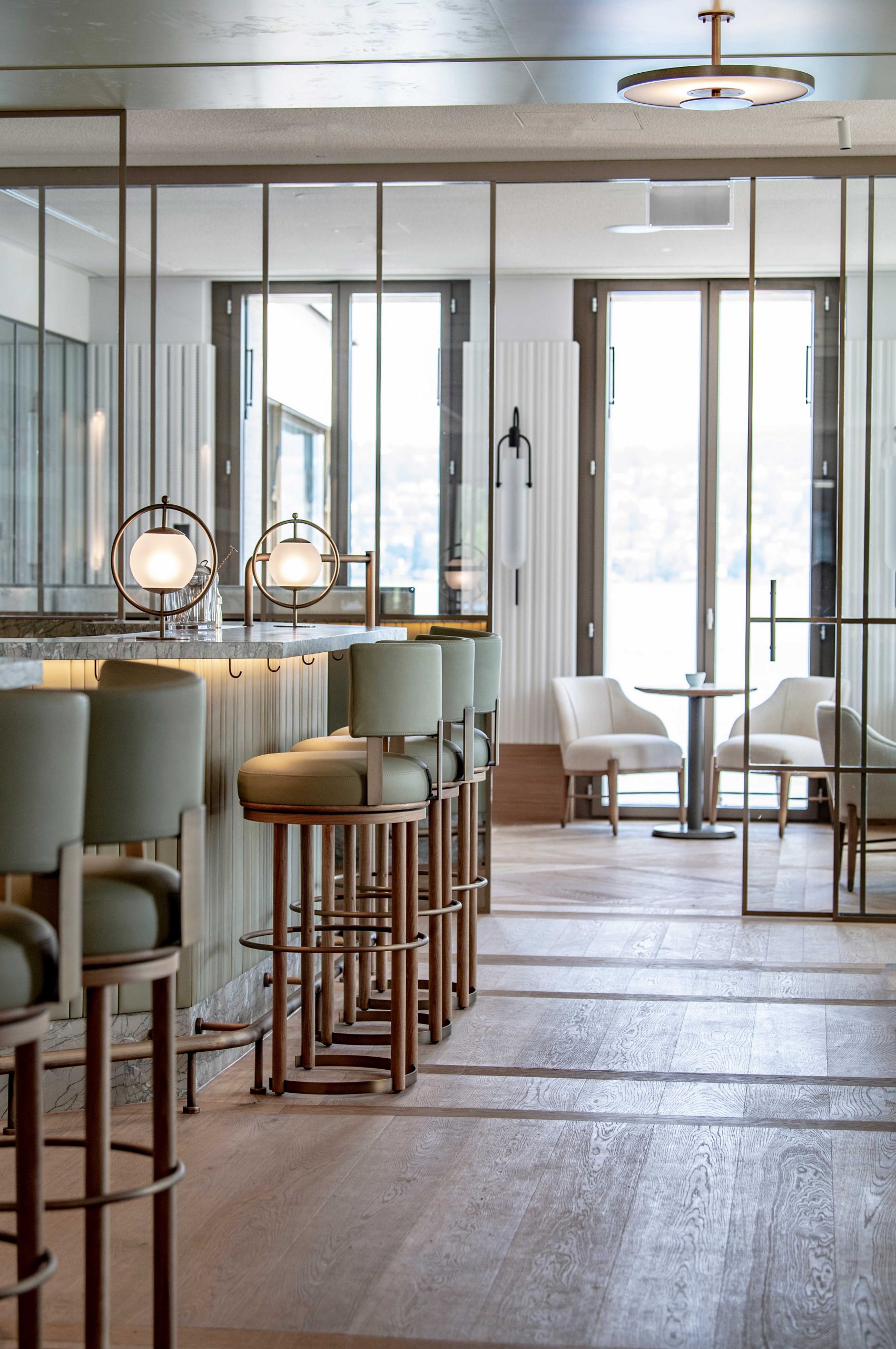 Elegant bar area stools and glass sliding doors view