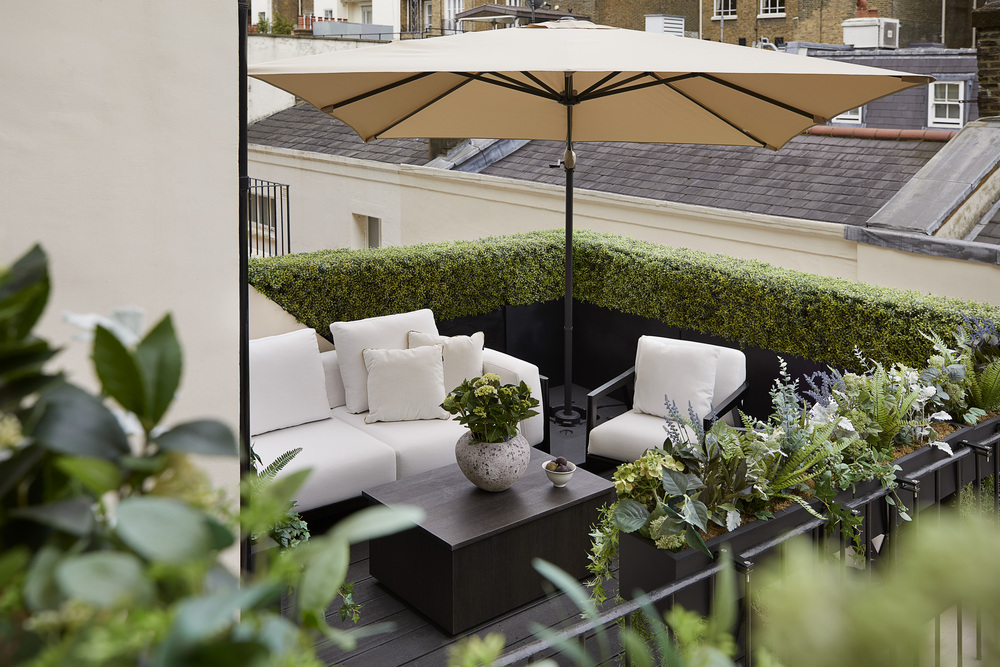 balcony with outdoor seating and shade